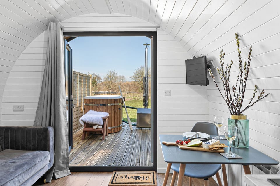 Views outside to the river from the cosy bed -Bramley Glamping Pod