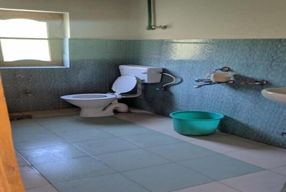 Shower, rainfall showerhead, towels, soap