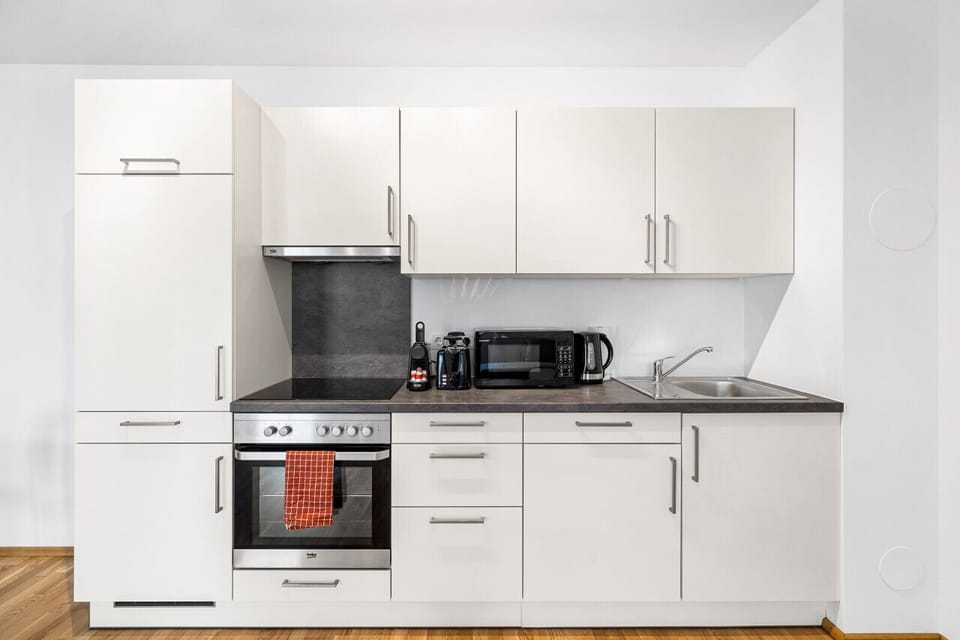 The kitchen is fully equipped and offers a microwave, a coffee capsule machine, a toaster, electrical kettle and many other things you need to prepare a meal.
