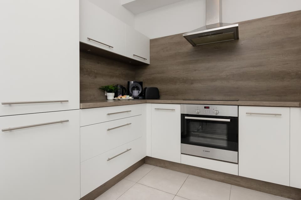 Another angle of the kitchen showing a clean and functional design.
