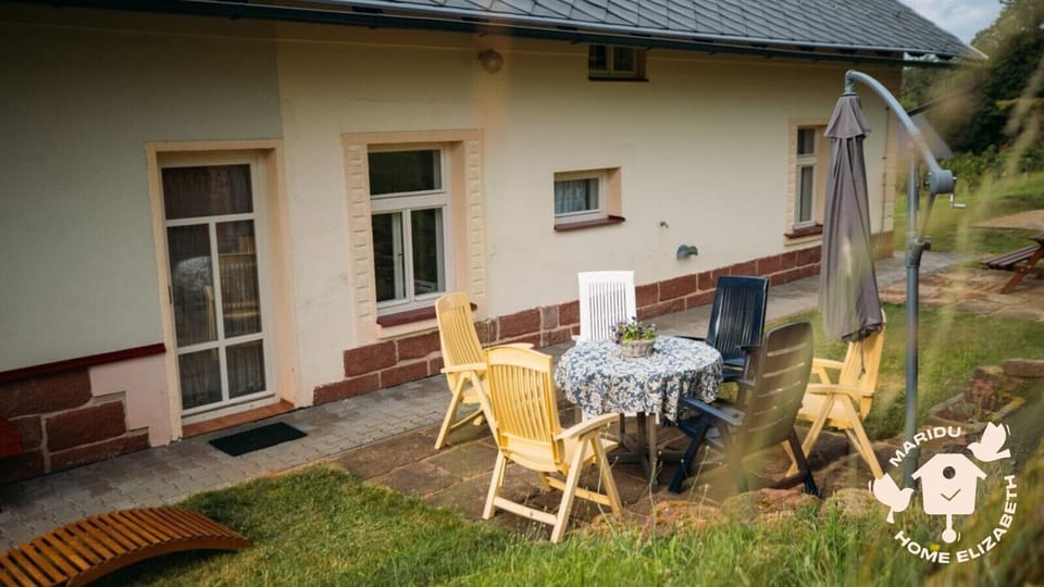 Relax outdoors with private seating and garden views at your doorstep