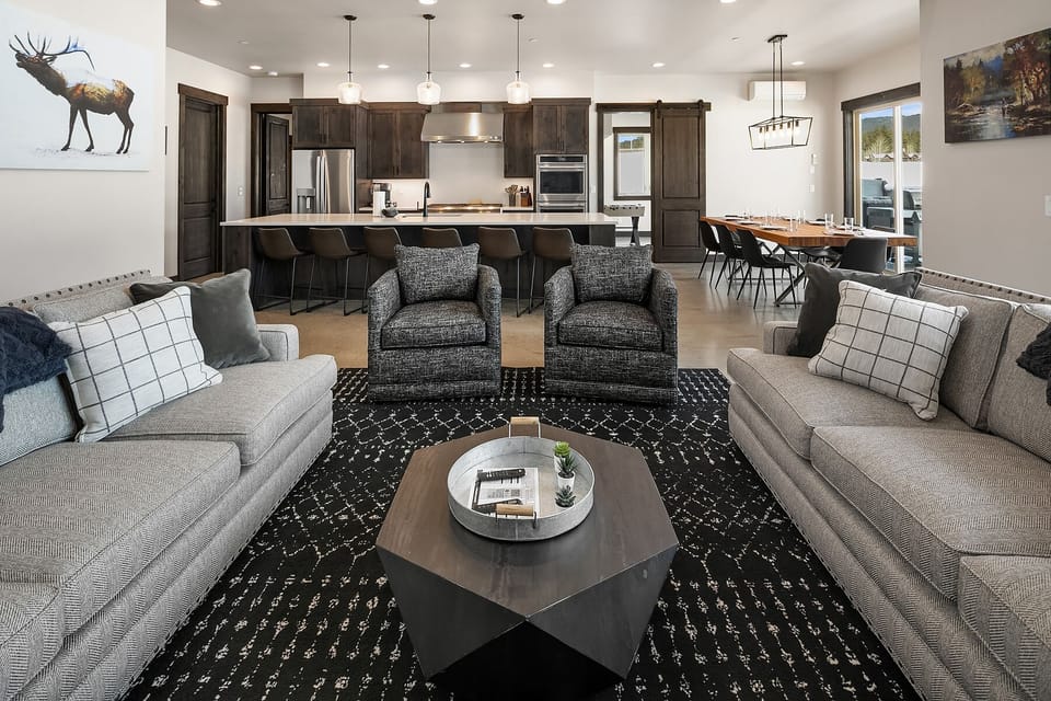 Knotty Pine: - Comfortable couches and swiveling chairs just off the kitchen. Fantastic for entertaining large families.