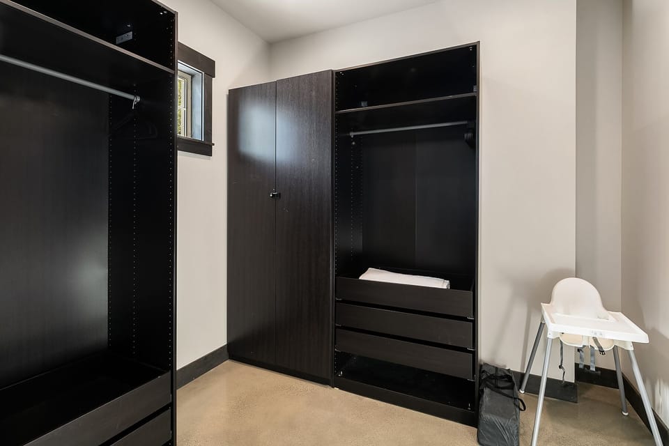 Knotty Pine: - Large master closet with a pack-n-play and high-chair.