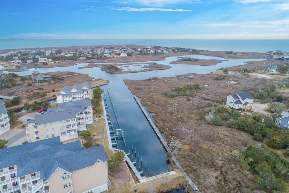 As you relax on the private balcony, take in the picturesque panoramic views of both the Atlantic Ocean and Pamlico Sound, inhale the salty breeze, and exhale as you listen to the harmony of nature’s noises of the surrounding marsh.