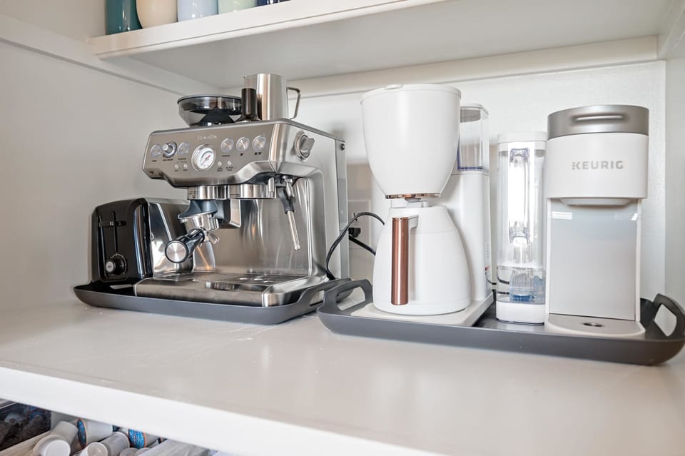Perk up your morning with a coffee crafted just for you! Our full coffee bar has something for everyone - try our espresso maker, drip coffee, or Keurig!
