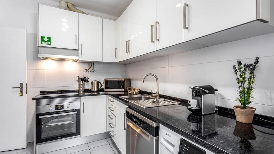 A modern and fully-equipped kitchen that will provide you with all the amenities necessary for the preparation of a delicious homemade meal #airbnb #home #cooking #algarve #vacations