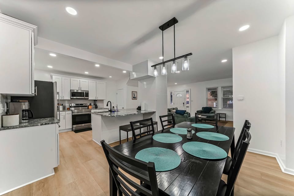 Dining area, breakfast bar, kitchen, and living room