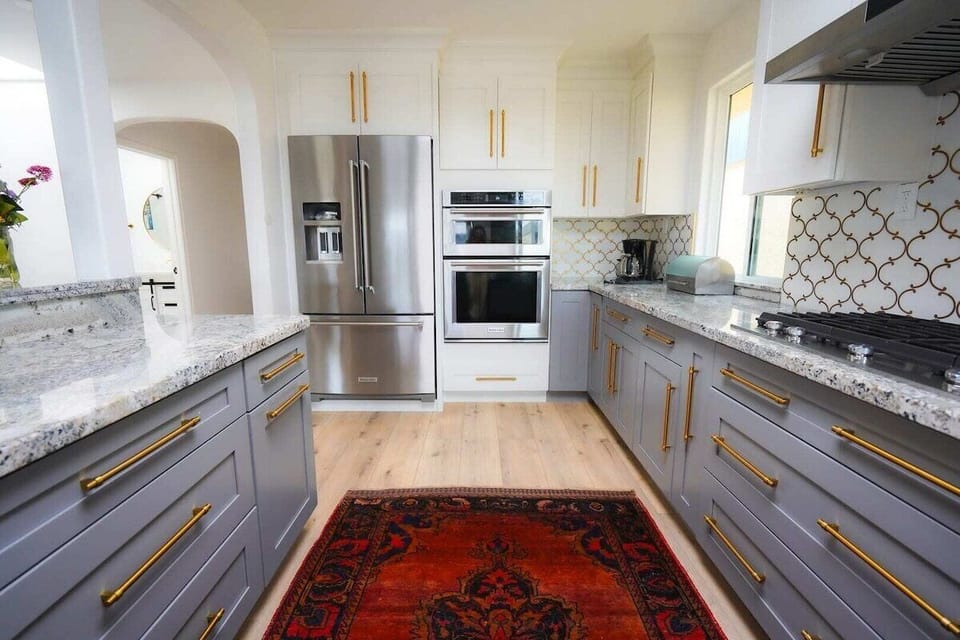 Fully equipped kitchen with stainless appliances and ample prep space