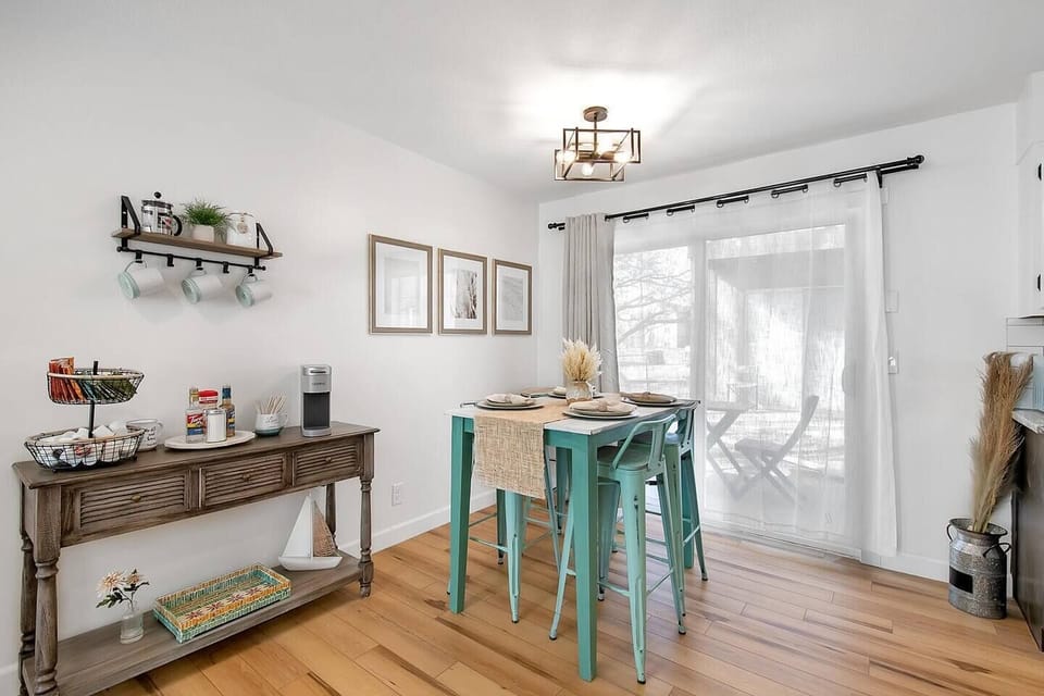 Dining Area with Patio Door and Coffee Bar