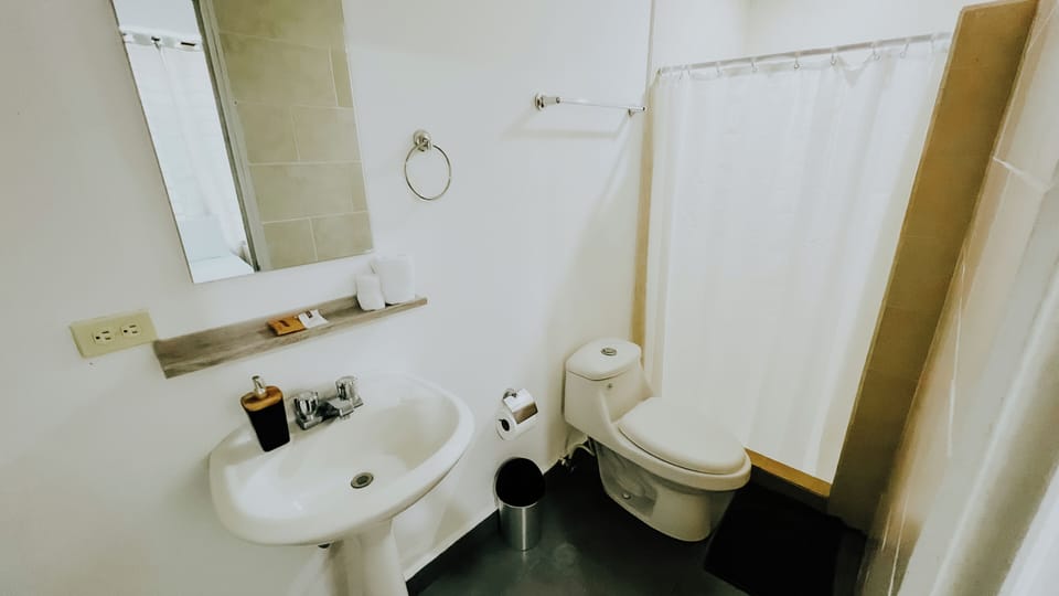 Executive Double Room, 2 Queen Beds | Bathroom | Shower, hair dryer, towels, soap