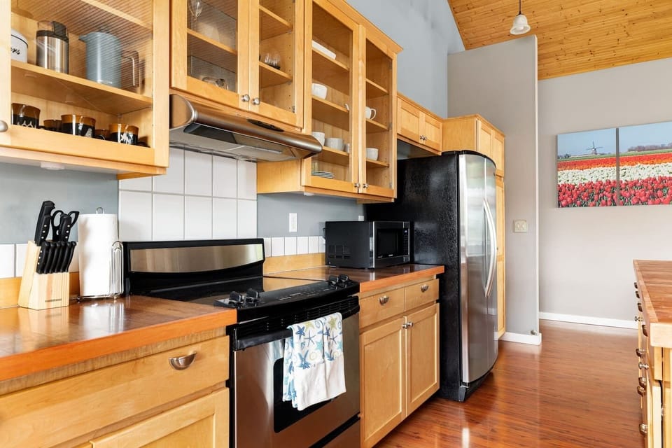 Large, well-equipped kitchen with ample storage and food preparation space