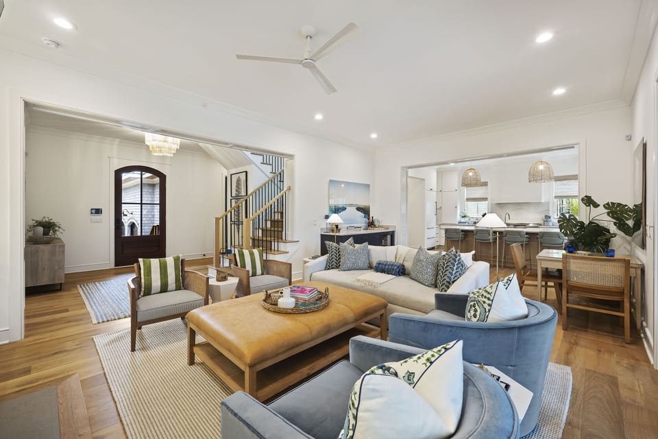 Bright and open Living Room with  lots of comfortable seating and access to the deck