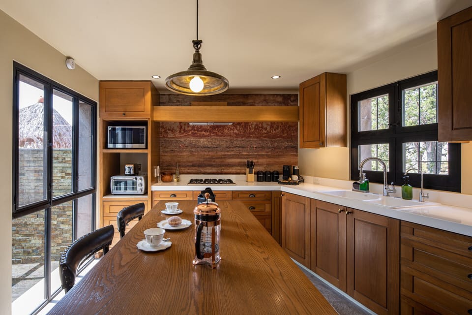 Luxury House | Private kitchen | Espresso maker, coffee/tea maker, full-size fridge, microwave