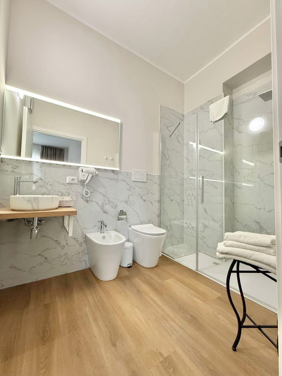 City Double Room, Courtyard View | Bathroom | Shower, hydromassage showerhead, hair dryer, slippers