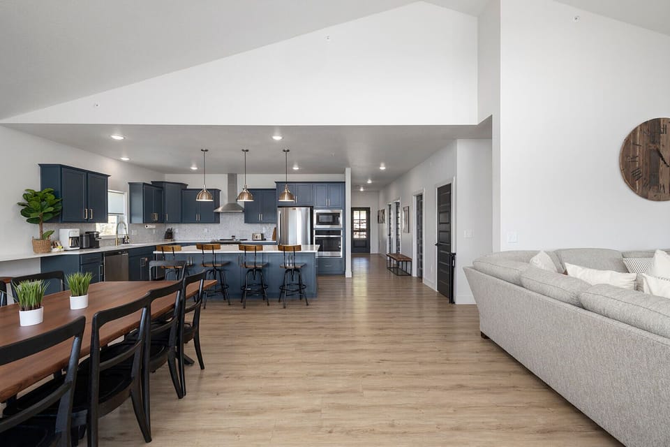 Great Room with Custom, Live Edge Walnut Table, Kitchen area, and Living Area