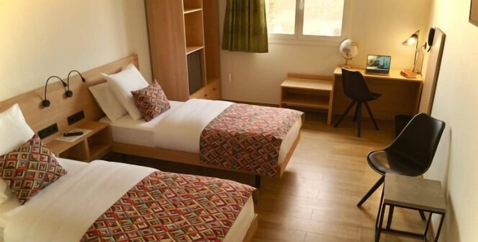 Twin Room | Desk, blackout drapes, soundproofing, iron/ironing board