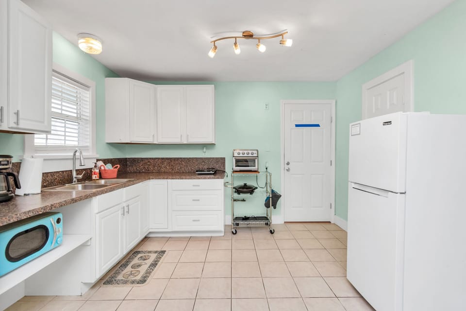 Kitchen w/ Toaster Oven, Electric Griddle and Hot Plate