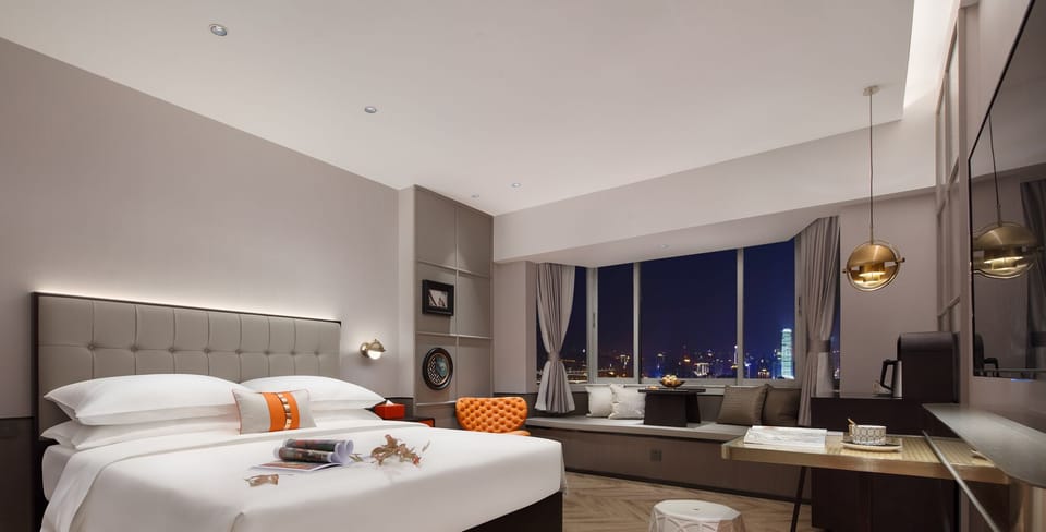Deluxe Room, 1 Queen Bed | Premium bedding, down comforters, memory foam beds, free minibar