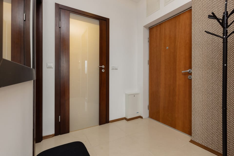 A detailed view of the front entryway and wardrobe area.
