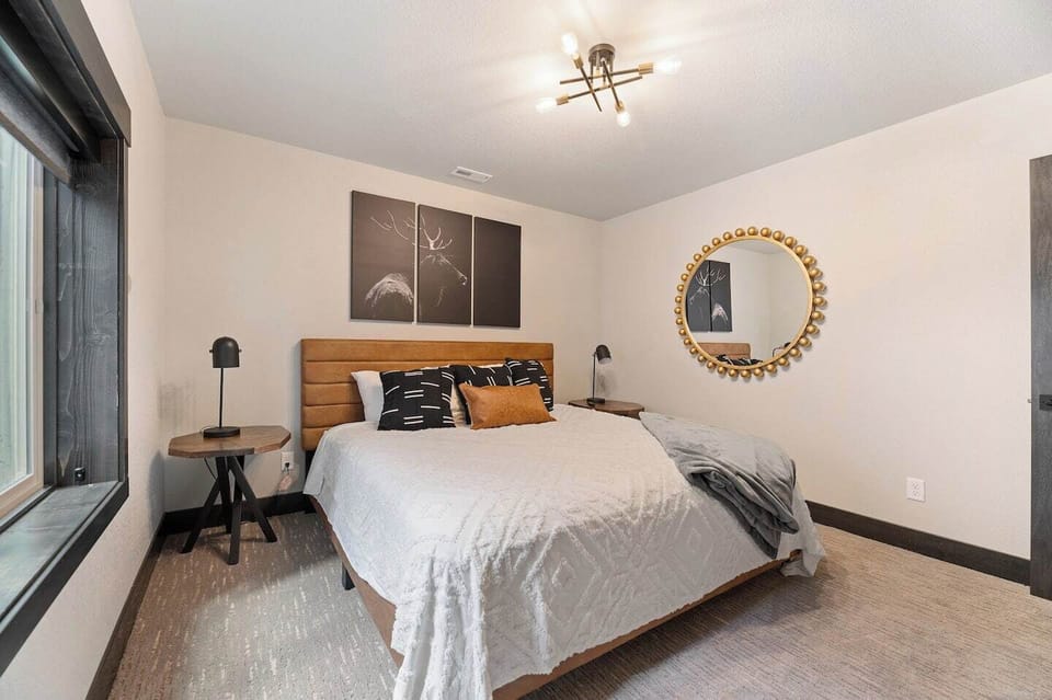 Private downstairs bedroom with king-sized bed. 