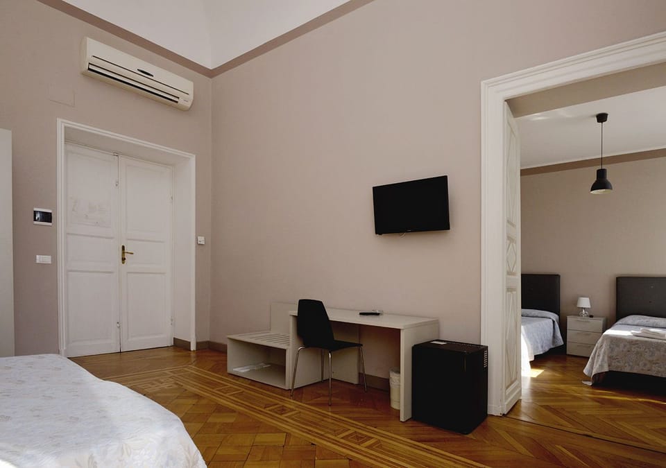 Family Room | Premium bedding, down comforters, memory foam beds, minibar