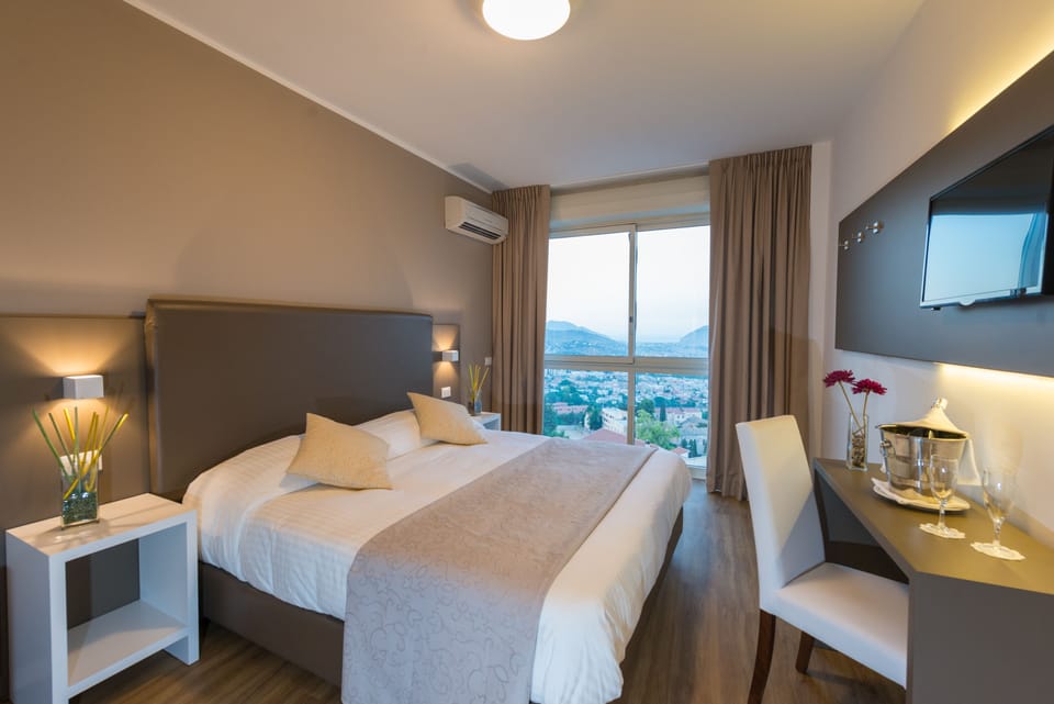 Standard Double Room, City View | Minibar, in-room safe, desk, soundproofing