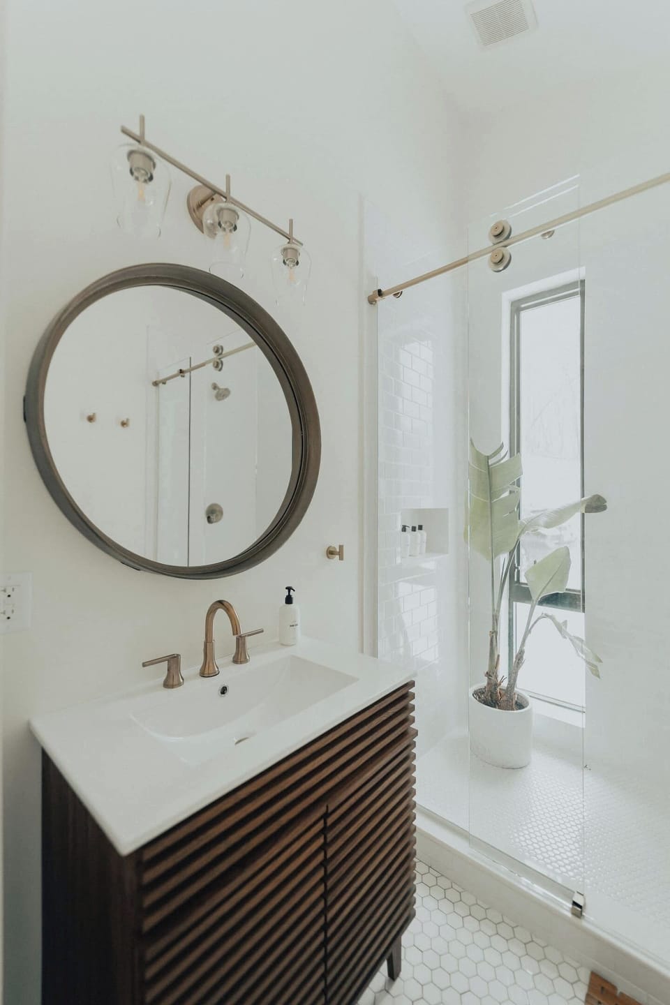 Bathroom 1 - walnut vanity and oversized mirror 