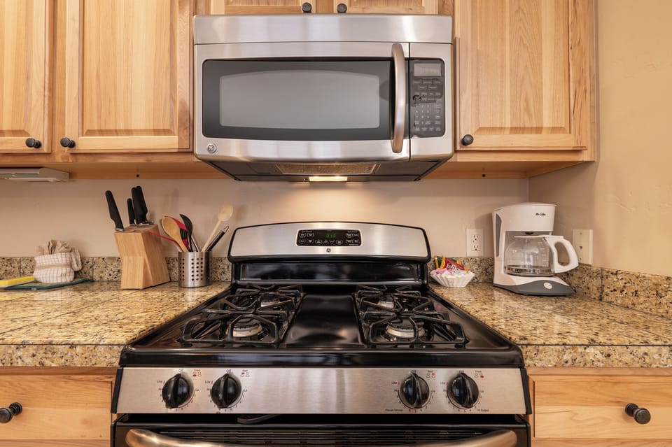 Your fully equipped kitchen features granite countertops, stainless steel appliances, and everything you need to prepare delicious meals during your stay.