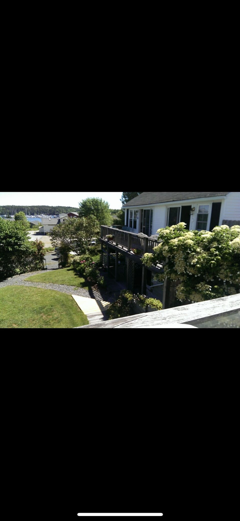 Second floor Birds Eye view of the harbor overlooking the garden area.