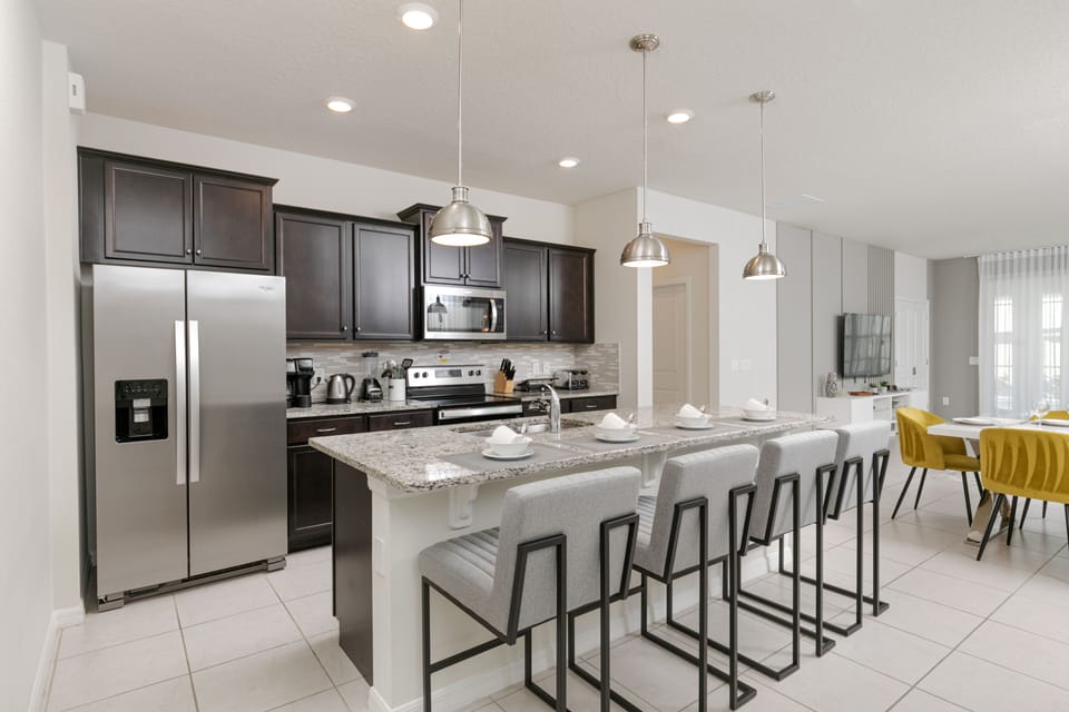 This kitchen is fully equipped with stainless steel appliances