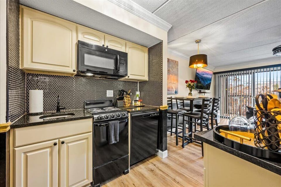 There is a fridge, stove, microwave, oven and dishwasher in our full kitchen