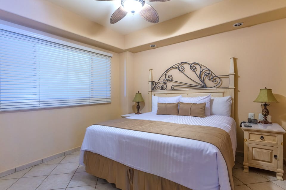 Deluxe Condo, 1 Bedroom, Ocean View | In-room safe, blackout drapes, soundproofing, iron/ironing board