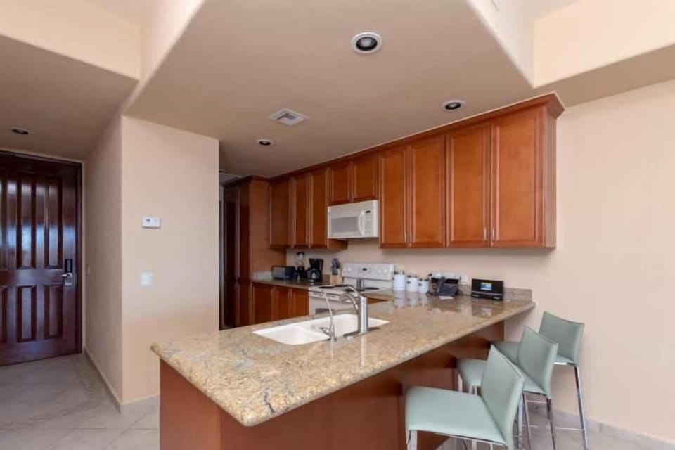 Luxury Suite, 2 Bedrooms, Ocean View | Private kitchen | Full-size fridge, microwave, oven, stovetop