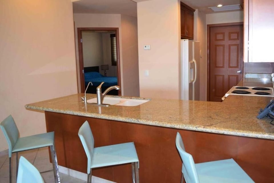 Luxury Suite, 2 Bedrooms, Ocean View | Private kitchen | Full-size fridge, microwave, oven, stovetop