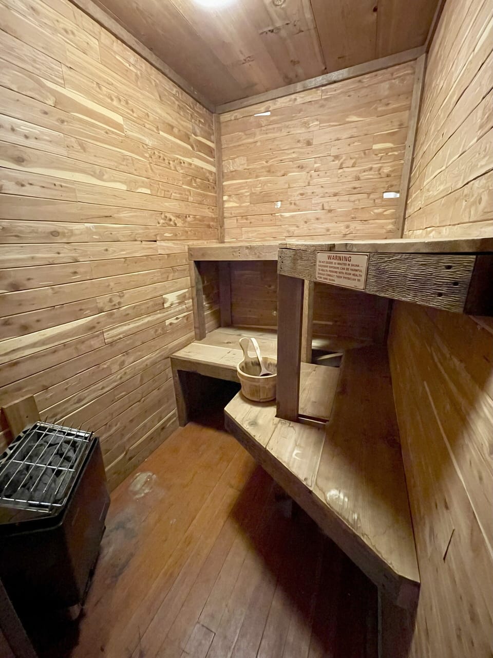The main floor electric sauna with cedar construction