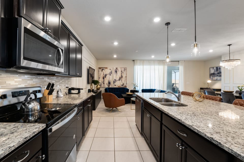 Alternate view of the kitchen overlooking the living room.