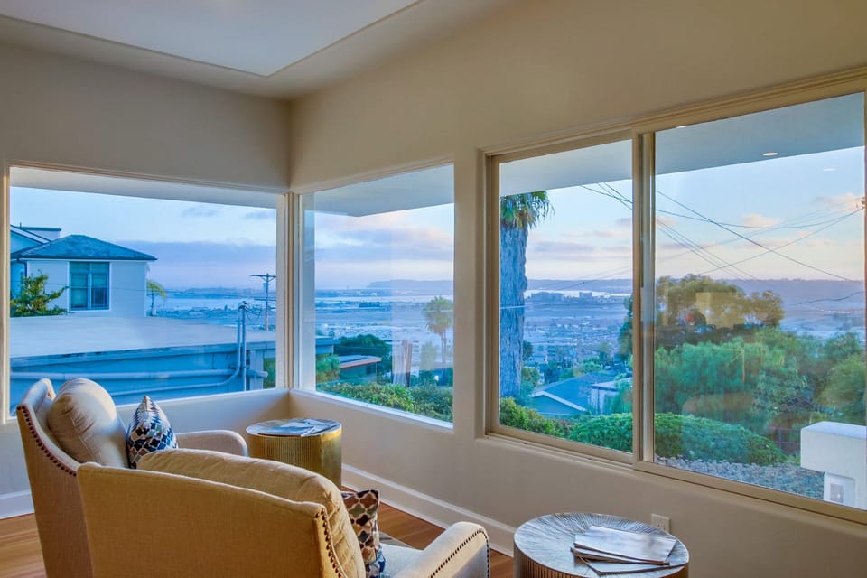 The living room offers stunning views in a comfortable, thoughtfully designed space.