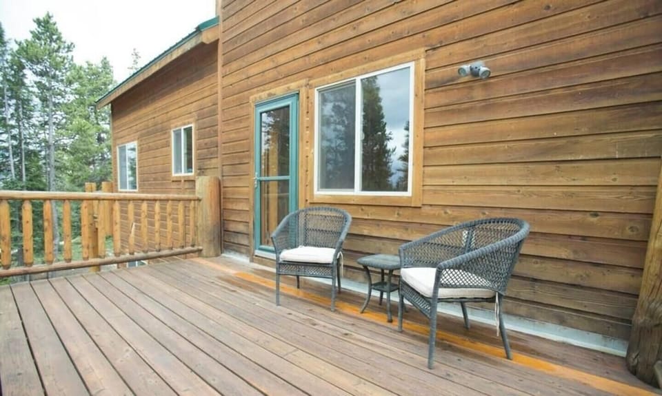 The deck off the bedroom on the main level is private and has seating