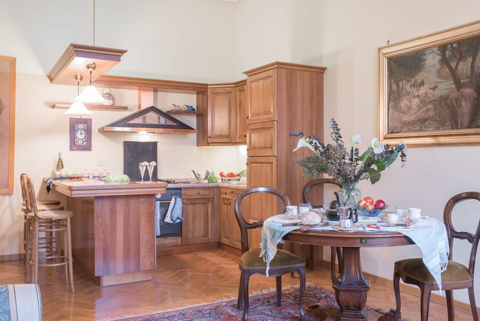 Furniture, Table, Cabinetry, Flower, Chair, Wood, Countertop, Picture Frame, Flooring, Building