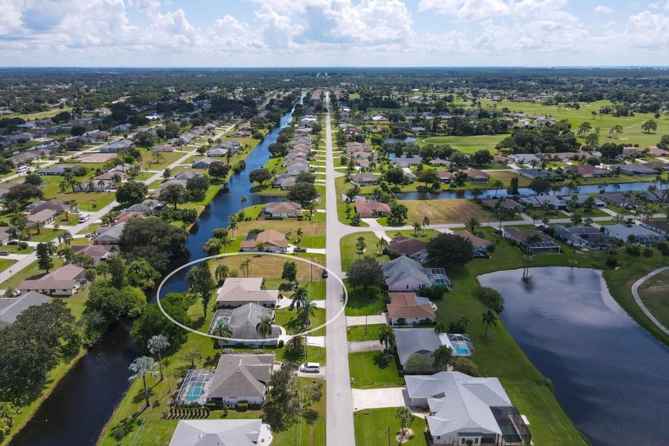 Aerial view of house and canal