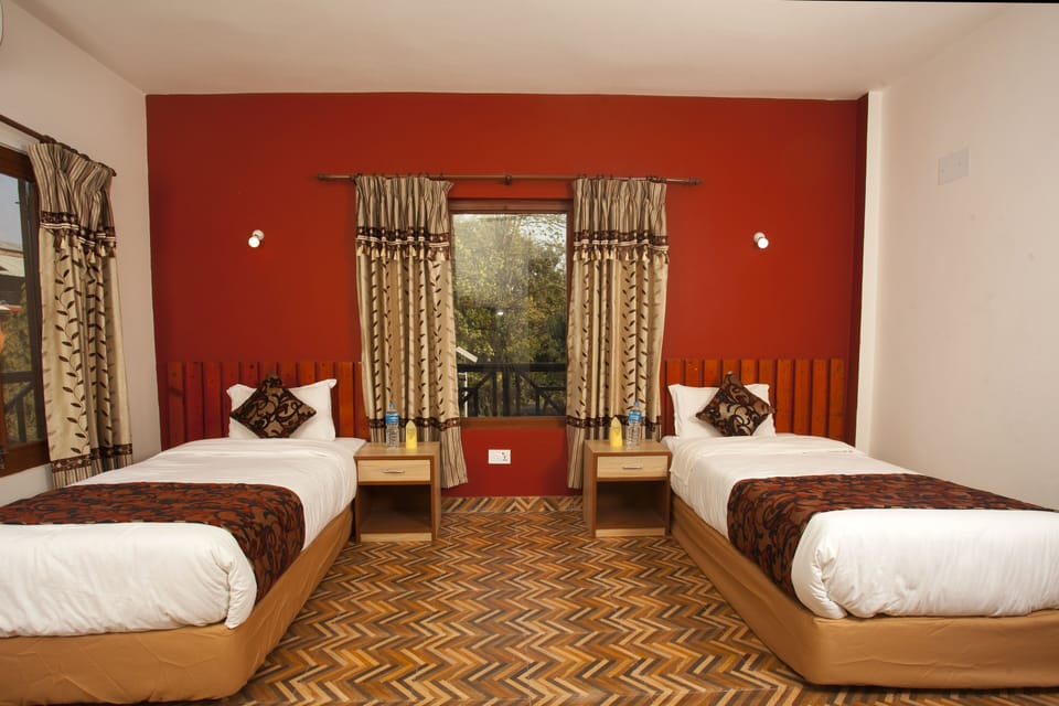 Deluxe Single Room, 2 Bedrooms | Down comforters, memory foam beds, individually furnished, desk