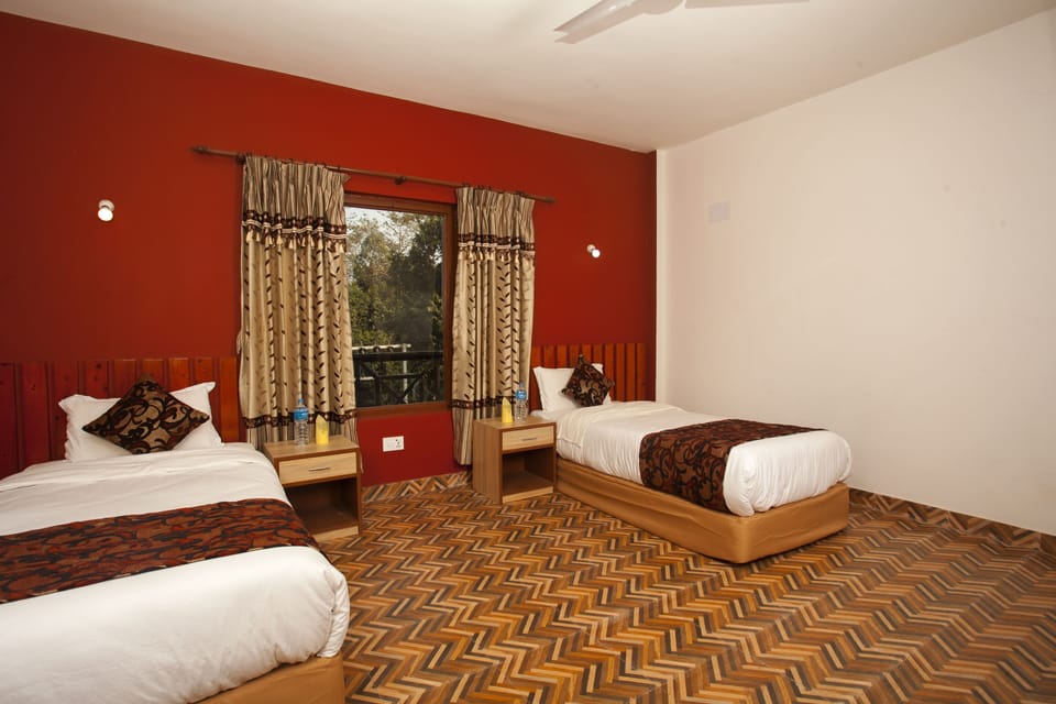 Deluxe Triple Room | Down comforters, memory foam beds, individually furnished, desk