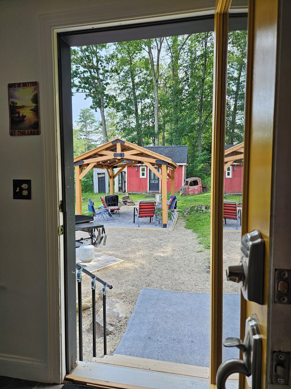  View of covered patio from the kitchen doorway.  Twinkle lites come on at P.M. 