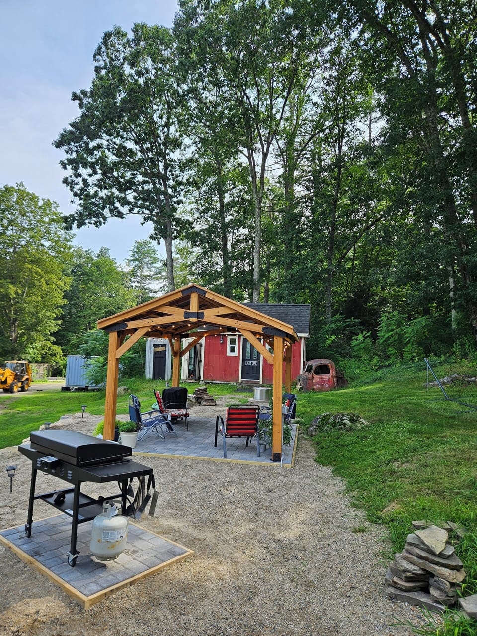 Black Stone griddle & ice chest conveniently located between patio and kitchen. 