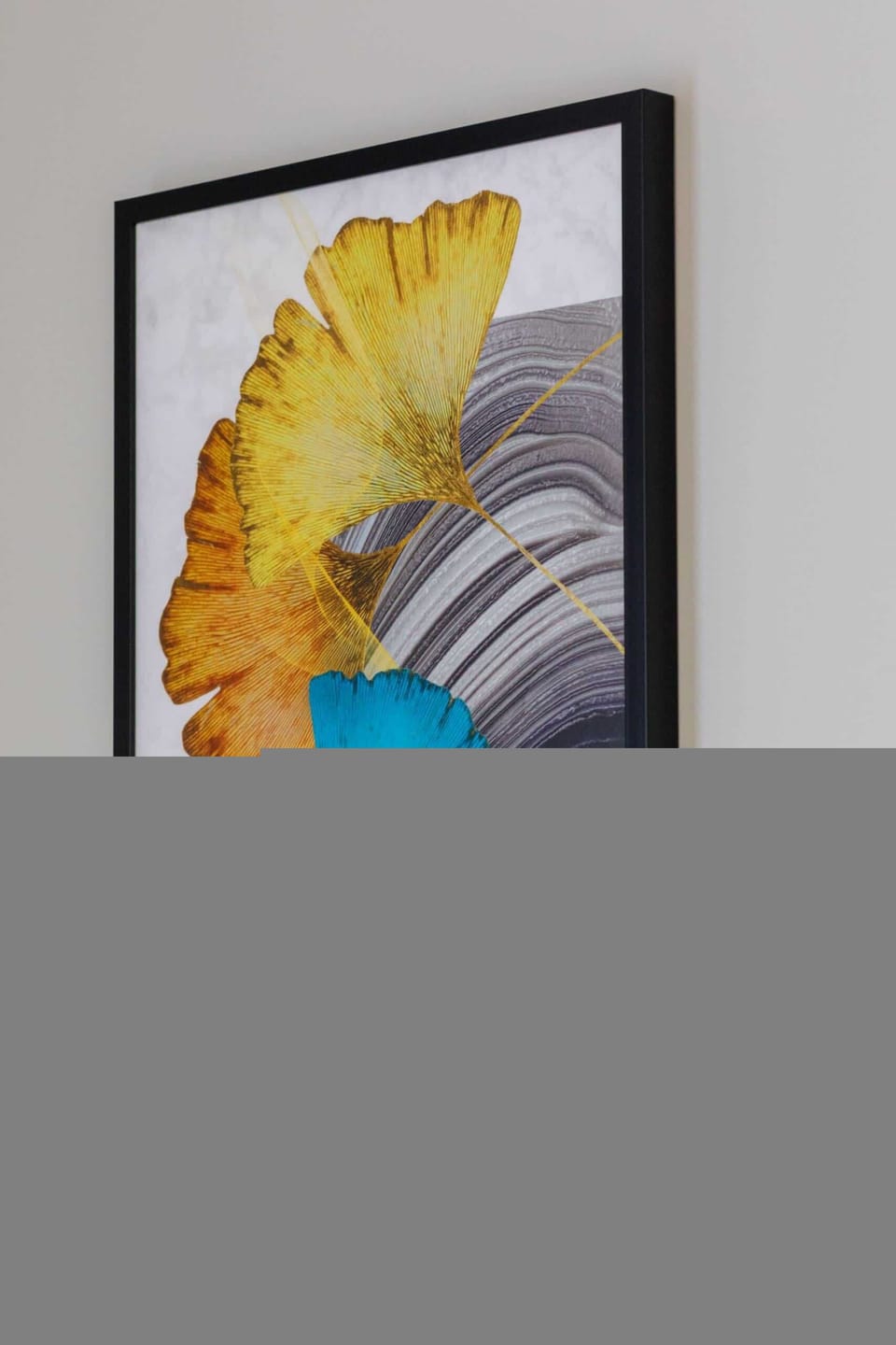 A close-up of an abstract painting in vibrant colors, adding character to the space.
