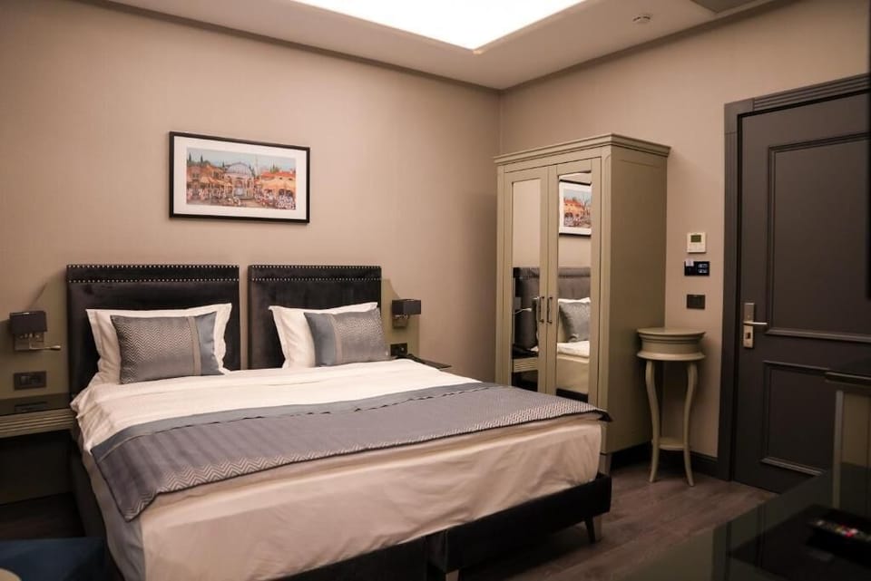 Standard Room | Blackout drapes, iron/ironing board, free WiFi