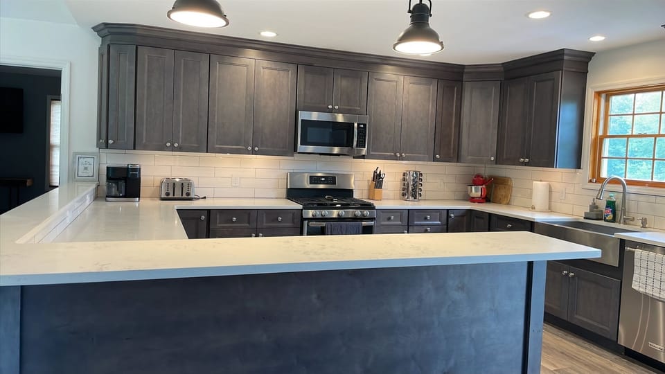 Chef’s kitchen with modern appliances for effortless meal preparation.