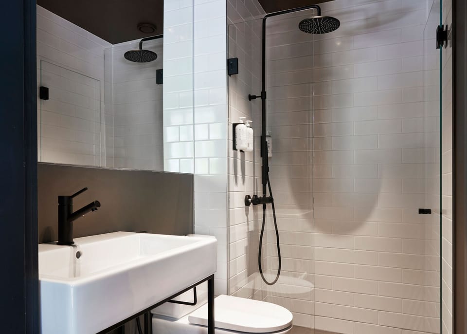 Shower, eco-friendly toiletries, hair dryer, towels