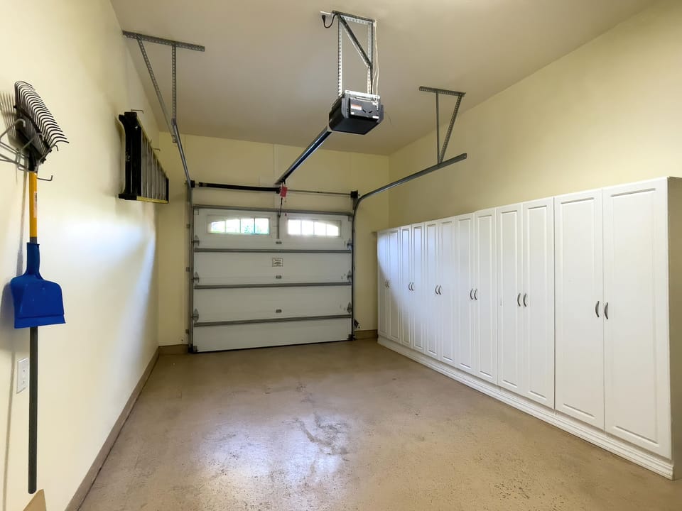 Secure private garage offers direct access to the unit and includes ample storage for beach gear or golf clubs.