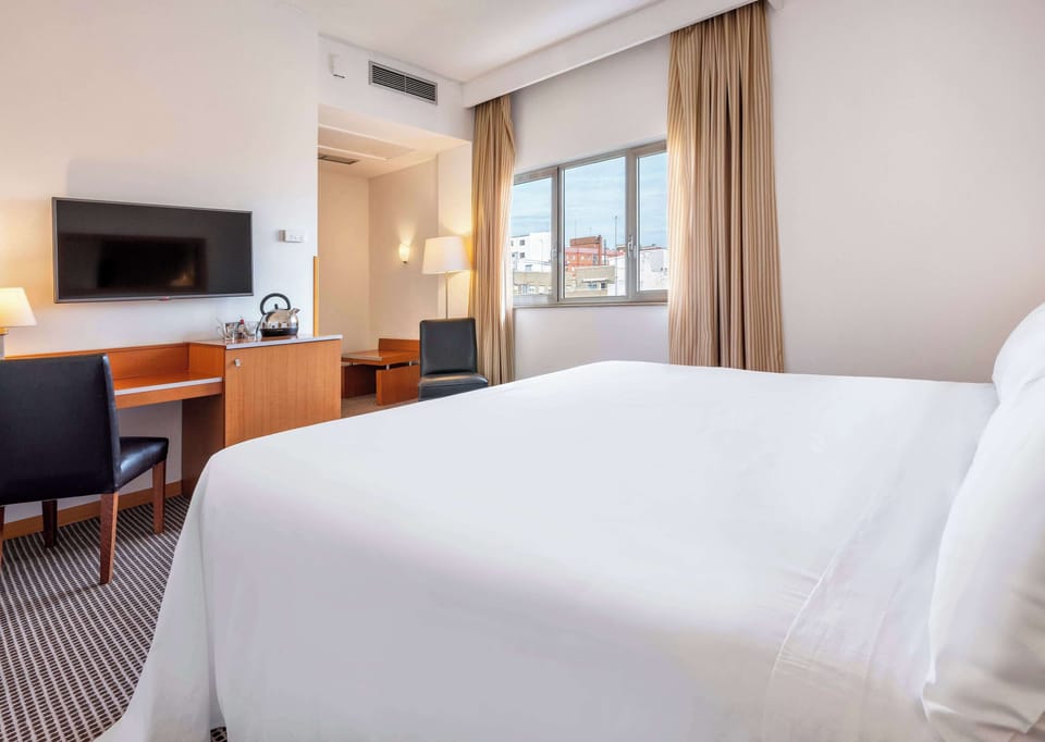 Memory foam beds, minibar, in-room safe, desk
